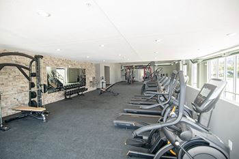 A gym with treadmills and weights.at Linc, Des Moines Iowa   